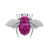 Brooch with rubies, sapphires, and diamonds, white gold.