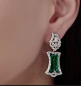 Earrings with verdelites and diamonds, in white gold.